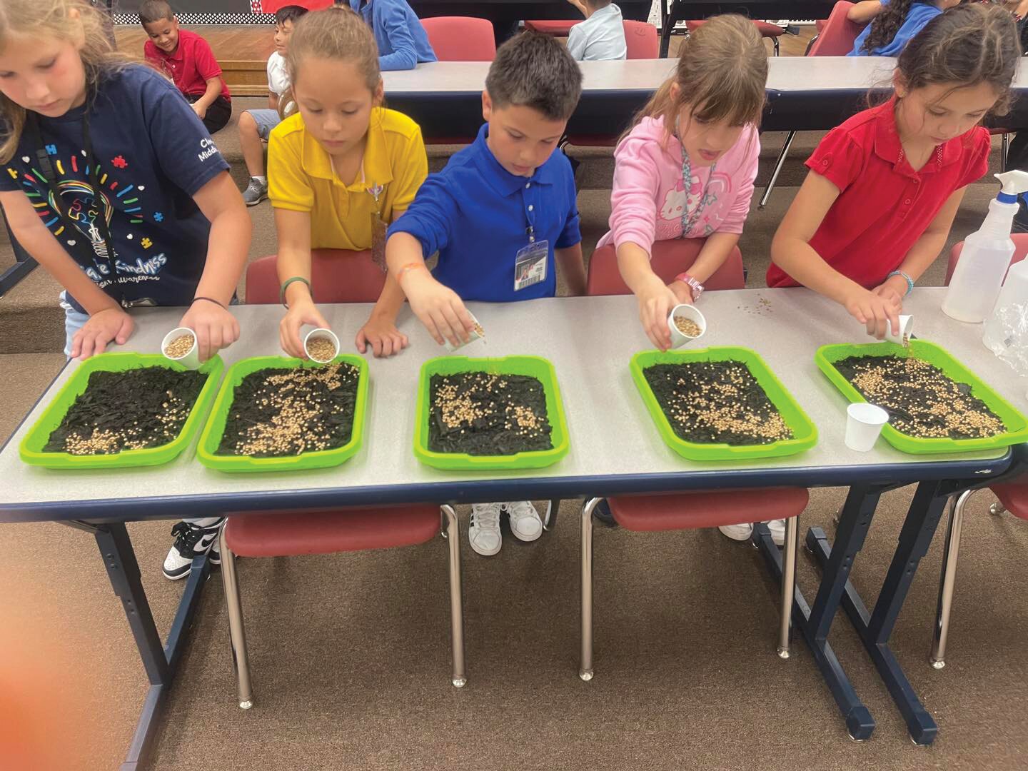 CLEWISTON -- Central Elementary School second graders are learning about how plants grow. They started their own garden with cilantro seeds. For more photos, see the school's page on Facebook. [Photo courtesy Central Elementary School]